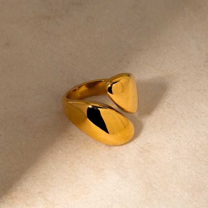 Adorn your days with the Mila Ring—a minimalist marvel with a glossy, waterproof finish. Its delicate metal embrace reflects a serene elegance, whispering poetic charm with every subtle shimmer.